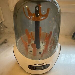 Baby Brezza Bottle Sterilizer in White and Black